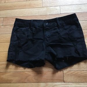 Distressed black shorts